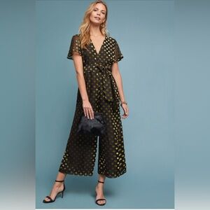 ASTR holiday gold and black polka dot jumpsuit with flutter sleeves
